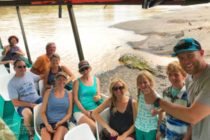 Happy tour visitors and a crocodile up-close!